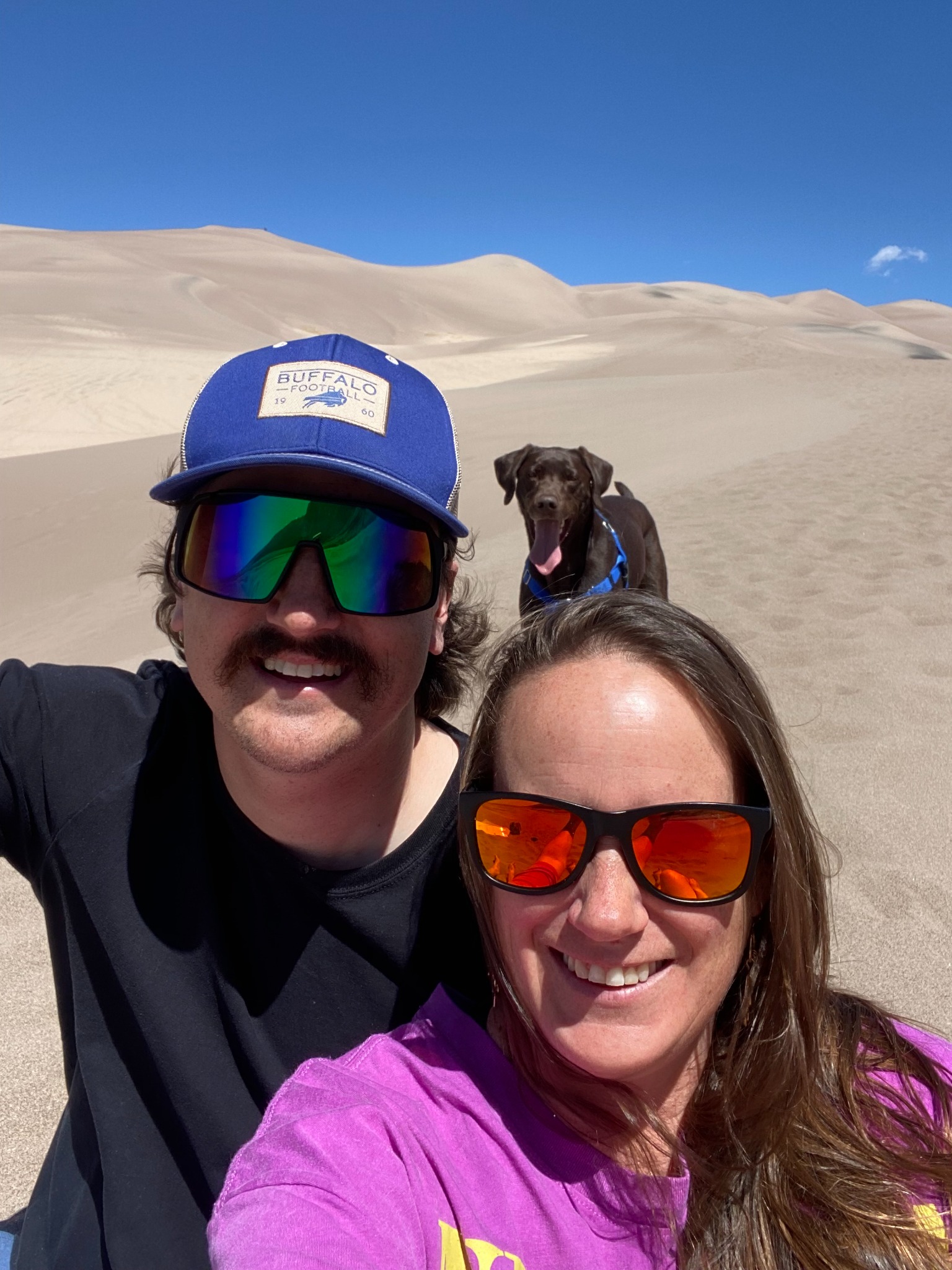 Ashley and Cody at the sand dunes with their dog