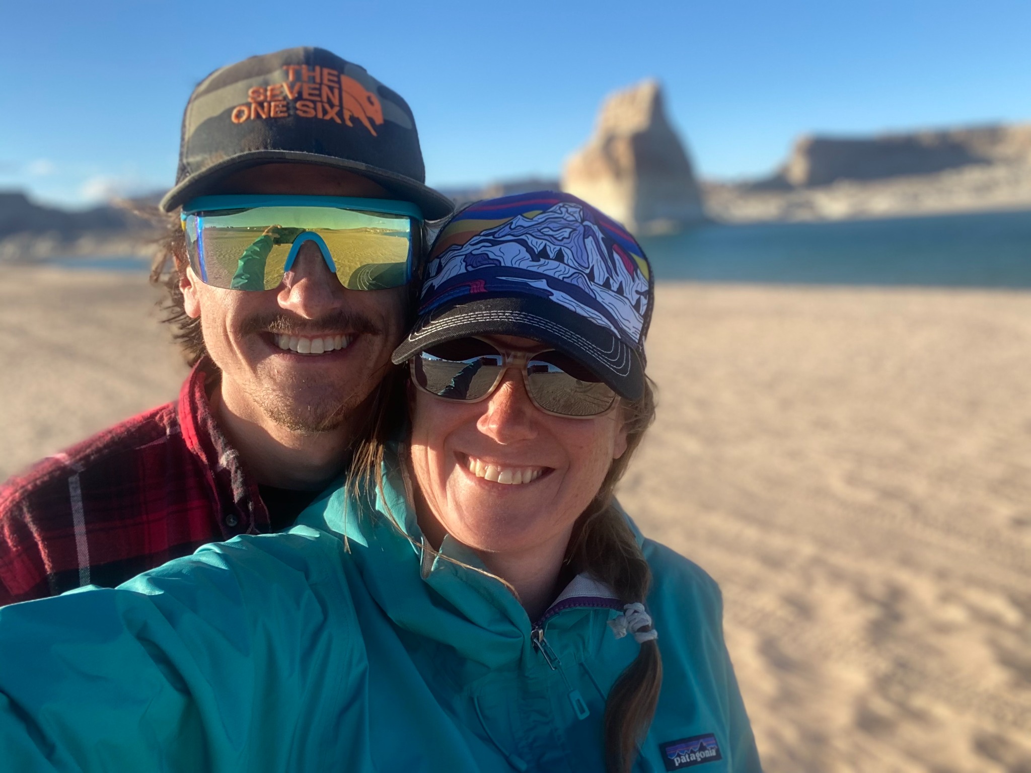 Ashley and Cody outdoors by the water